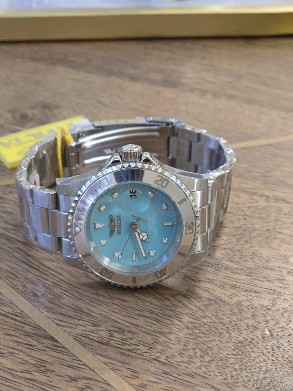 Invicta Men’s Professional Turquoise Dial Stainless Steel Dive Watch